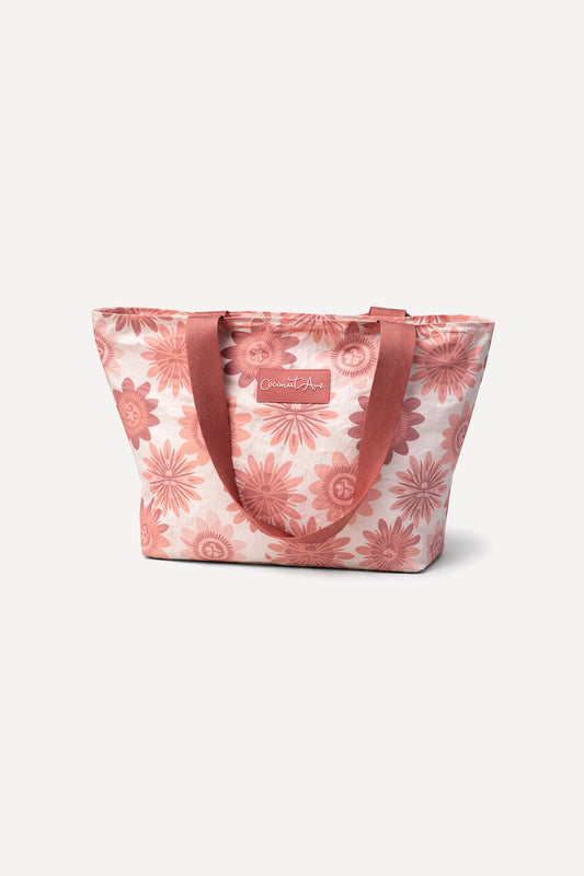 Coconut Ave Hele Tote in Lilikoʻi Blooms print made from splash-proof Tyvek® with reinforced shoulder straps.