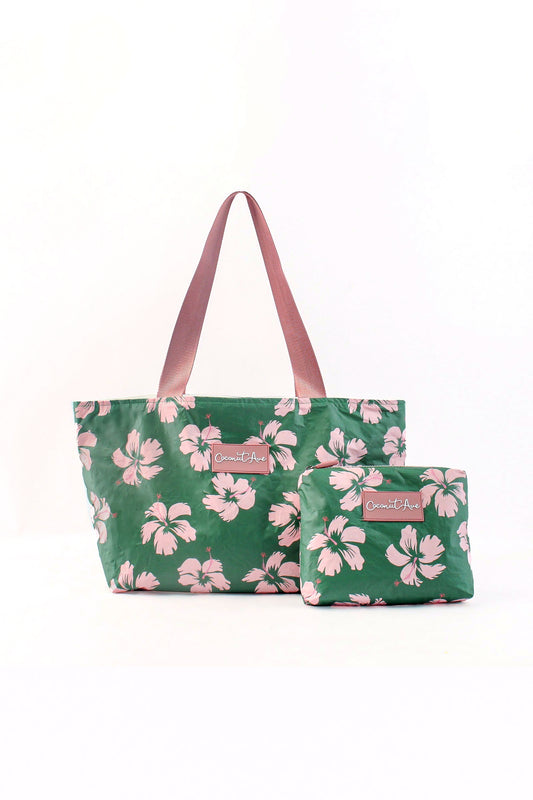 Green floral tote bag with pink flowers on a white background