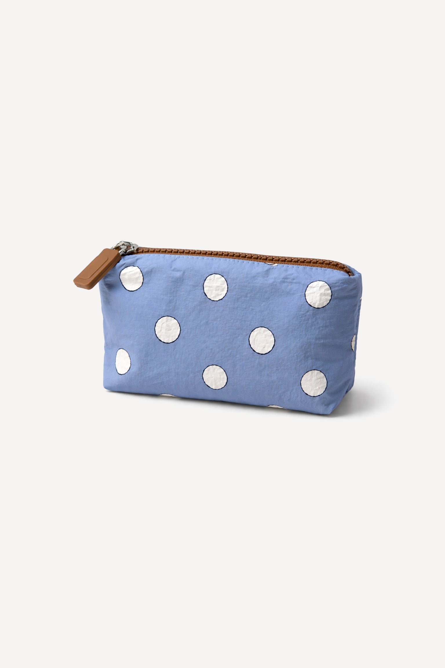 Coconut Ave Hele Wallet Pouch in the Denim Coco Dots print made from splash-proof Tyvek® for storing cards, cash, and everyday essentials.