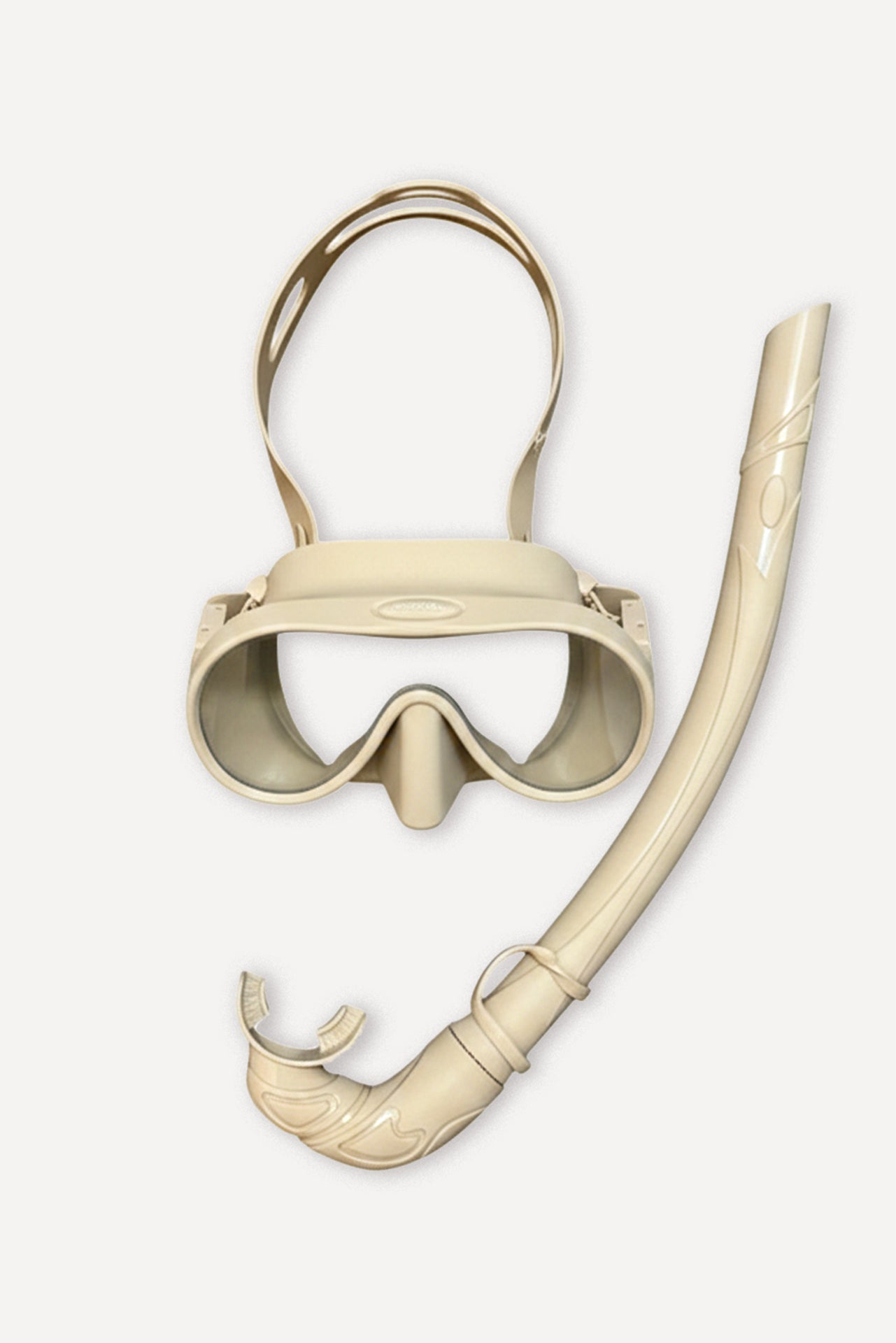 Biscuit-colored silicone mask and snorkel set with tempered glass lenses.