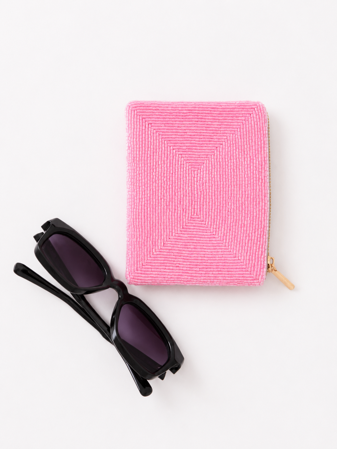 Back view of the Coconut Ave Bikini Money Coin Purse featuring pink handcrafted beadwork.