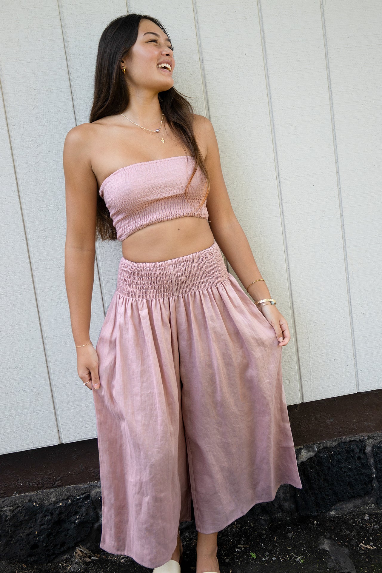 Model wearing the Coconut Ave Dreamweaver Pant in Rosey with the matching Smocked Tube Top.