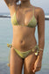 Close-up of the Coconut Ave Hula Triangle Top in the Moray print highlighting the classic triangle cups, adjustable shoulder straps, tie-back closure, double-lined construction, and green and yellow tropical-inspired pattern designed for women's swimwear.