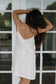 Puka Shell Day Tripper Dress shown from the back for relaxed resort wear during a tropical vacation.