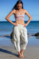 Full-length front view of the Coconut Ave Dreamweaver Pant in Bamboo paired with the matching Smocked Tube Top.