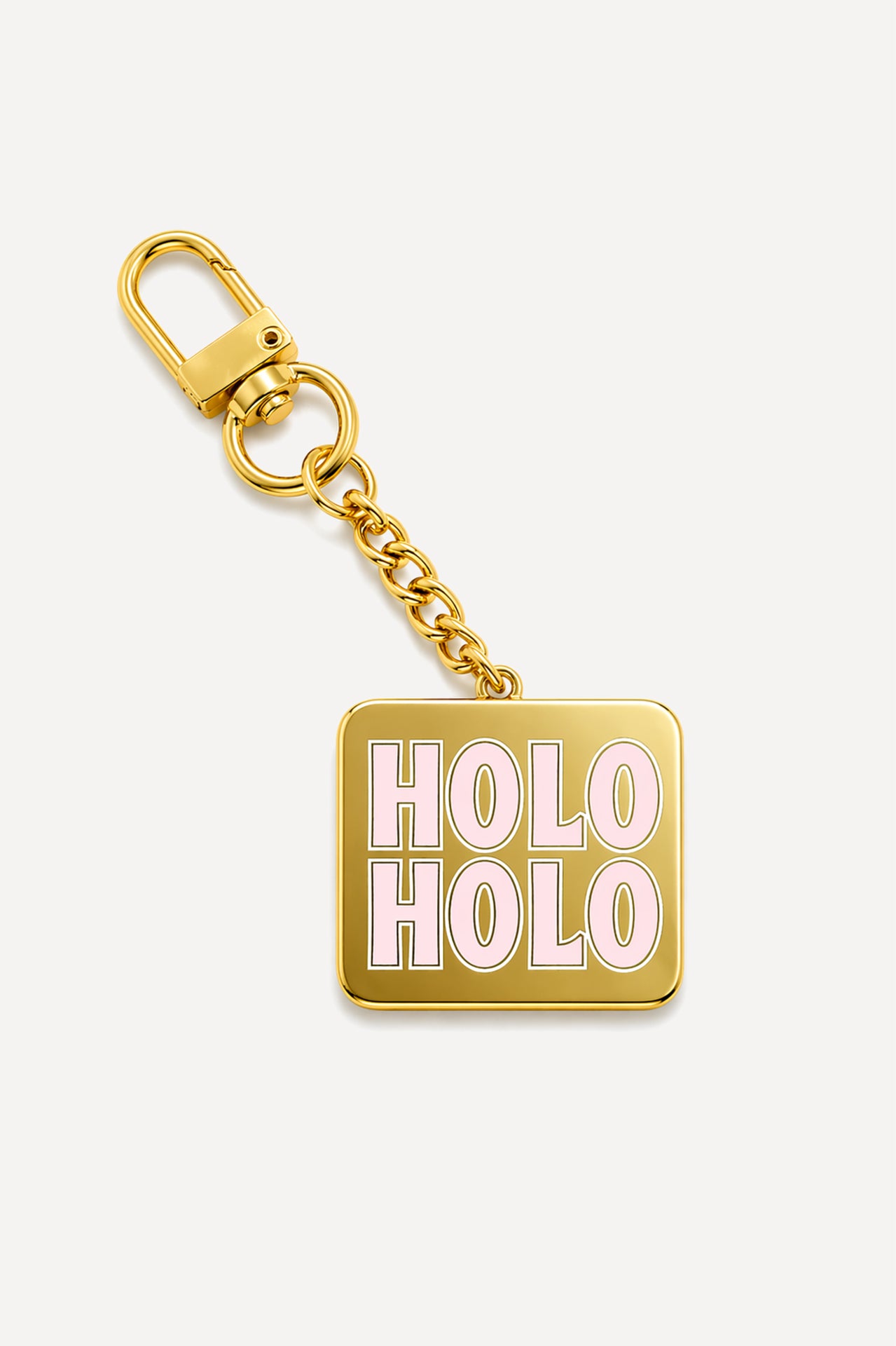 Holo Holo enamel keychain with gold hardware featuring an original Coconut Ave design.