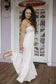 Mau'umae Maxi Dress in Puka Shell paired with sandals for an easy beach vacation outfit outdoors.