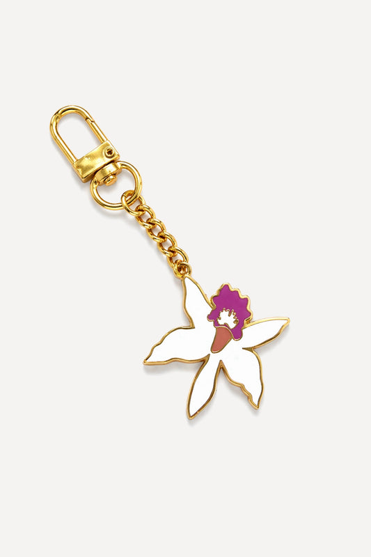 Puna Orchid enamel keychain featuring a hand-drawn Hawaiian orchid design with gold hardware by Coconut Ave.