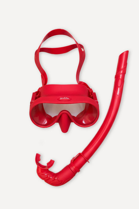 Red silicone mask and snorkel set with tempered glass lenses.