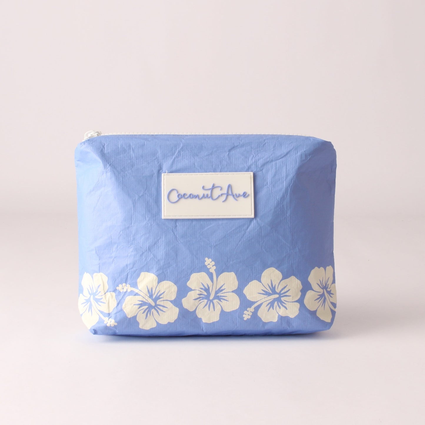 Small Hele Pouch in Retro Pua Cornflower Blue print made from water-resistant Tyvek® by Coconut Ave.