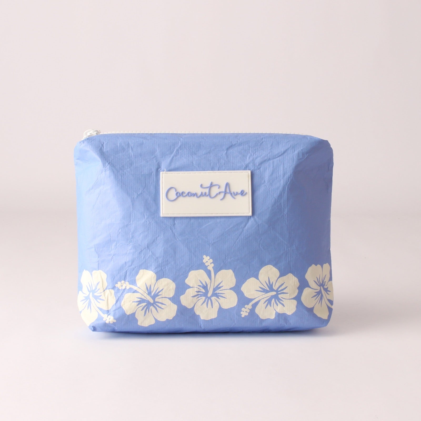 Small Hele Pouch in Retro Pua Cornflower Blue print made from water-resistant Tyvek® by Coconut Ave.