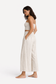 Side view of the Smocked Tube Top in Flax with matching linen pants.