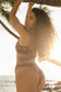 Back view of the Twist Top in Chocolate Bloom showing the cropped silhouette