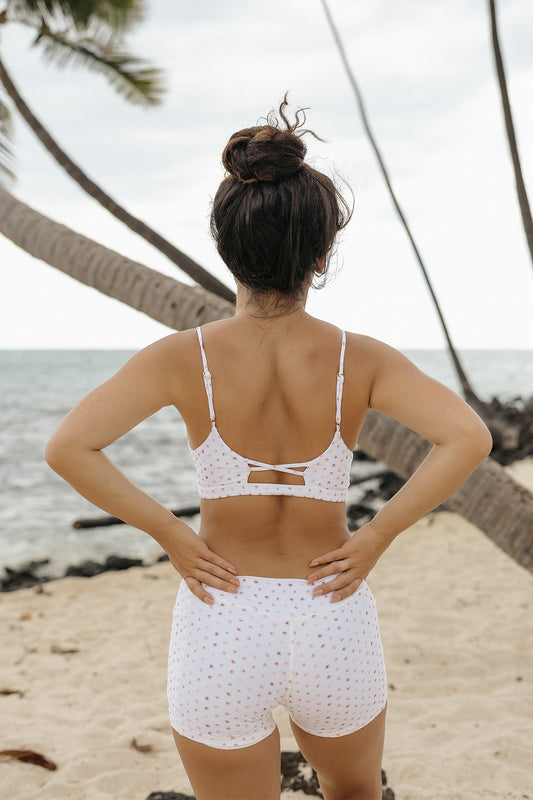 Back view of the Twist Top in Puka Shell print showing the adjustable back detail